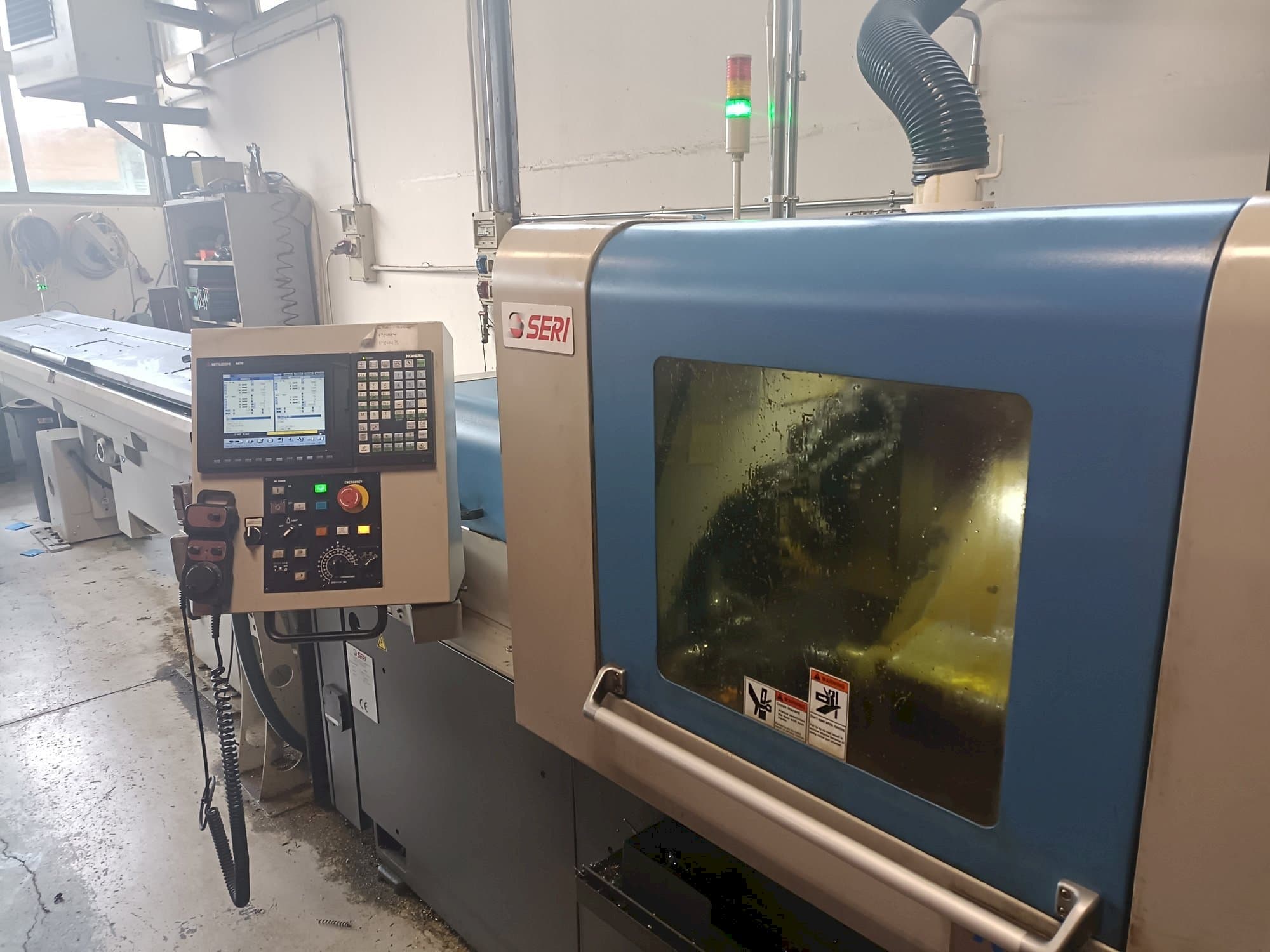 Frontansicht der NOMURA Maschine