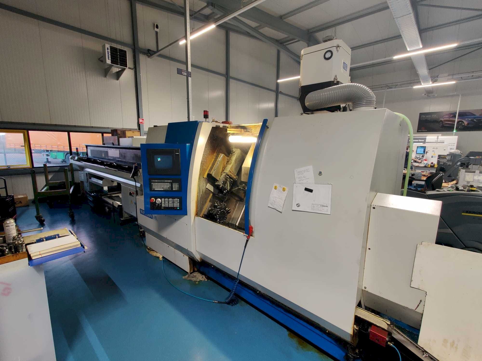 Frontansicht der Manurhin K'MX XL 32  Maschine